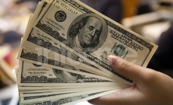 Imagen de la nota: Comercios y particulares podrán comprar y vender dólares