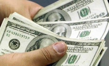 Imagen de la nota: El dólar saltó de $9.70 a $14.30 : en la Ciudad algunos bancos no venden